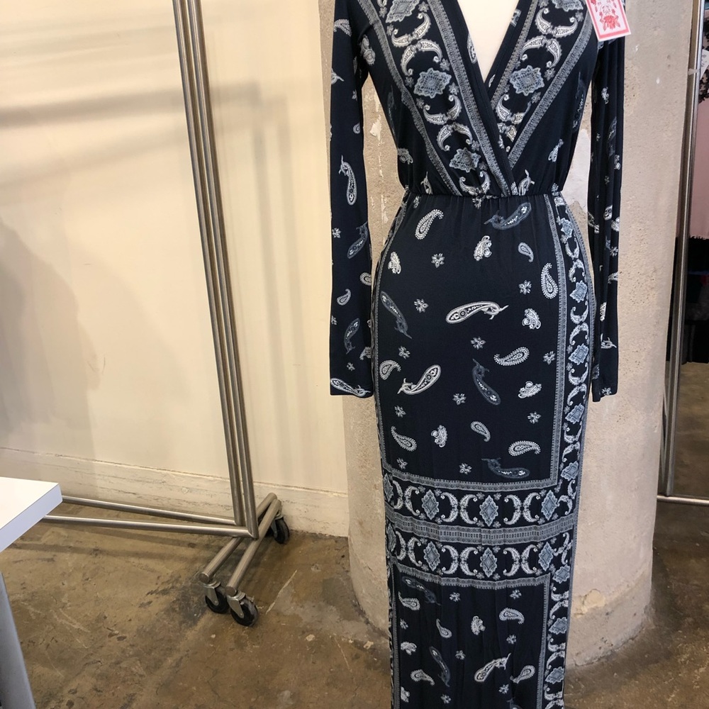 Long slv maxi dress with side slit from  Colcci